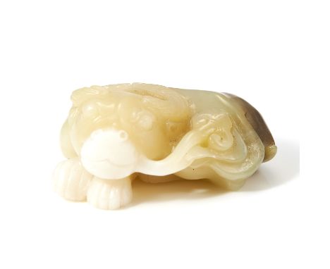 A CHINESE CARVED JADE RAM STATUE carved in detail to depict a ram, curled up and laying down, 5.8cm, 85g.