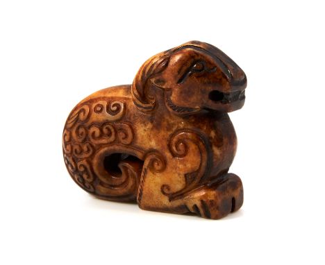 A CHINESE JADE RAM FIGURE carved to depict a ram with scroll decorated body, 6.2cm, 70g.