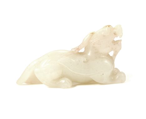 A CHINESE JADE LION STATUE carved in detail to depict a lion recumbent, 7.4cm, 70g.