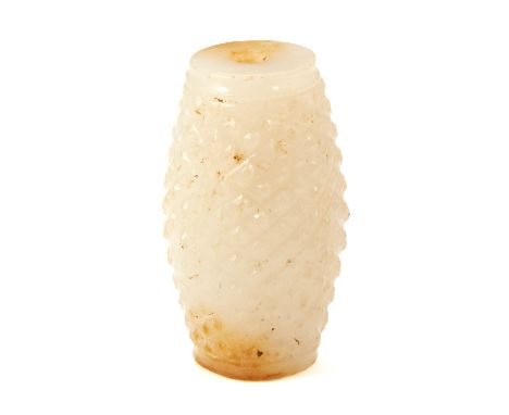 A CHINESE WHITE JADE BEAD of barrel form, carved with textured crosshatch decoration, 4.6cm, 53g.