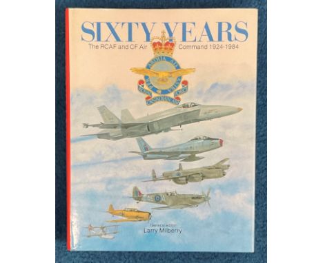 WW2. Larry Milberry Signed Book Titled 'Sixty Years The RCAF and CF Air Command 1924 1984' Signed on first page with date 199