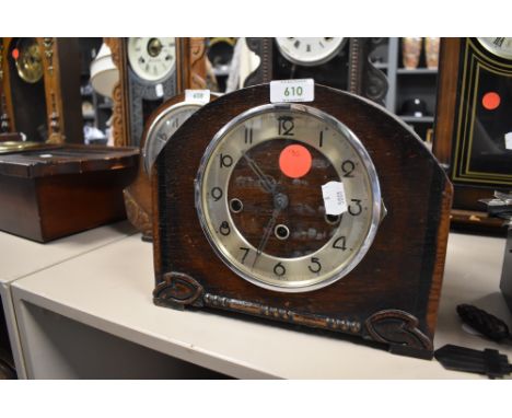 A mid century mantel clock