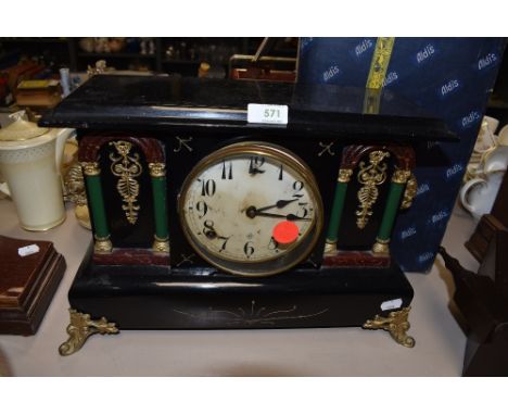 An American 8 day Marble effect mantel clock