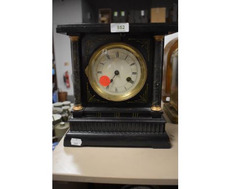 A Victorian 8 day mantel clock in wooden case with enamel face
