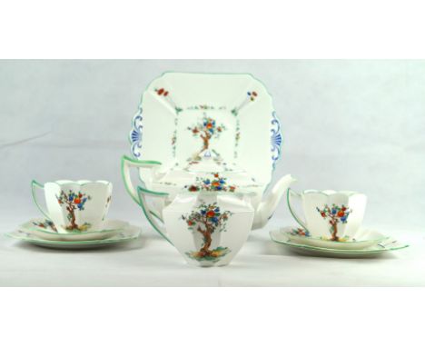 A Shelley bone china part tea service 
Decorated in the 'Crabtree' pattern in the Queen Anne shape, comprising teapot, milk j