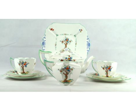 A Shelley bone china part tea service 
Decorated in the 'Crabtree' pattern in the Queen Anne shape, comprising teapot, milk j