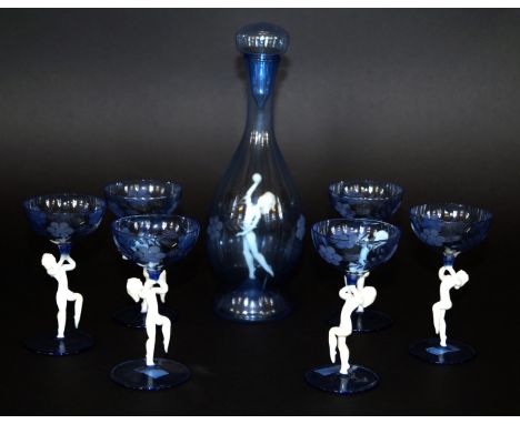 An Art Deco style blown glass drinking setPossibly by Istvan Komaromy, comprising decanter with milk glass internal nude figu