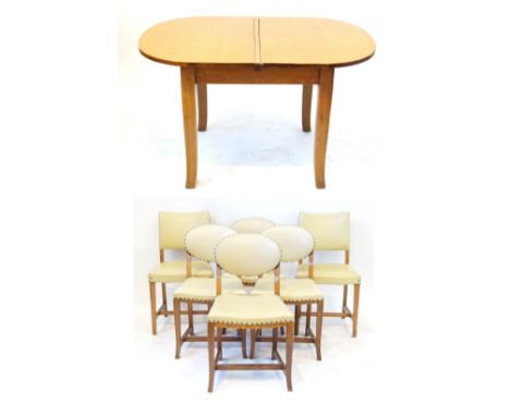 An Art Deco light oak framed dining suiteComprising 'D' end shaped table, raised on block supports, harlequin set of six chai