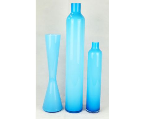 A suite of three contemporary glass vasesIn the manner of Holmegaard, decorated in blue with a opal encased interior, height 