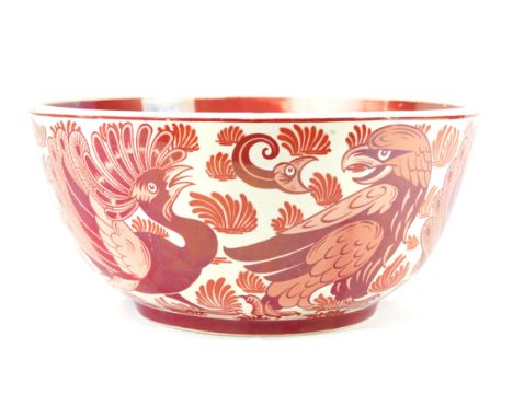 A large William De Morgan bowl of circular formDecorated with Eagles and mythical birds by Fred Passenger, with ringed mark a