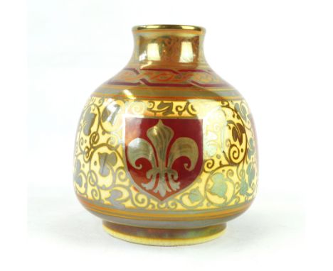 A Pilkingtons Royal Lancastrian lustre vaseOf squat bulbous form, decorated with four red shields highlighted in silver with 