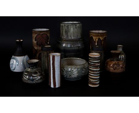 Twelve pieces of Briglin studio pottery To include large vase having incised linear motifs to top rim, height 23cm, two cylin