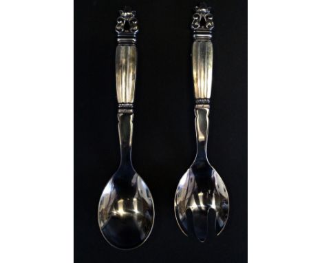 A pair of Georg Jensen sterling silver salad serversDecorated in the 'Acorn' pattern with stainless steel bowls, length 20cm 