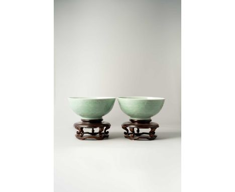 A FINE PAIR OF LARGE CHINESE IMPERIAL CELADON ‘PEONY’ BOWLSSIX-CHARACTER QIANLONG SEAL MARKS AND OF THE PERIOD 1736-95Each we