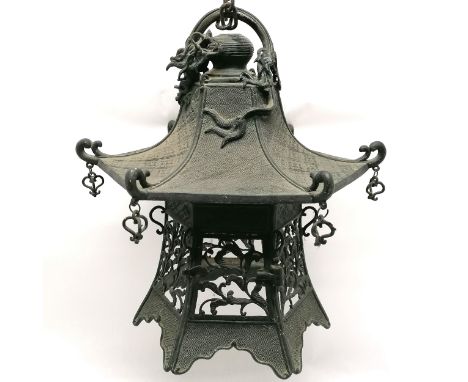 Antique Chinese bronze hanging lantern in the form of a pagoda with dragon detail to top and has opening door to 1 side - 37c