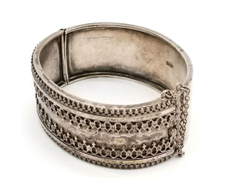 Antique silver hallmarked bangle (2.5cm wide) - 6.5cm across &amp; 33g ~ slight loss to detail of 1 edge on front 
