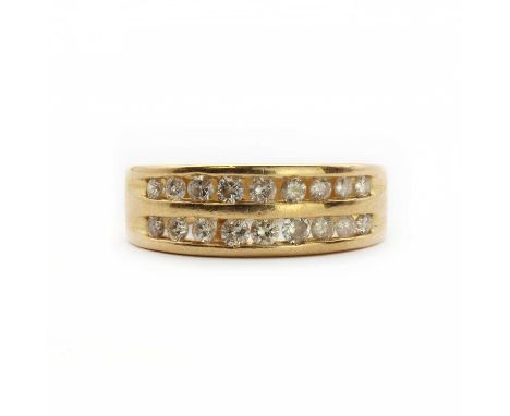 An 18ct gold diamond half-eternity style ring,designed as two rows of round brilliant diamonds, channel set to the ring head,