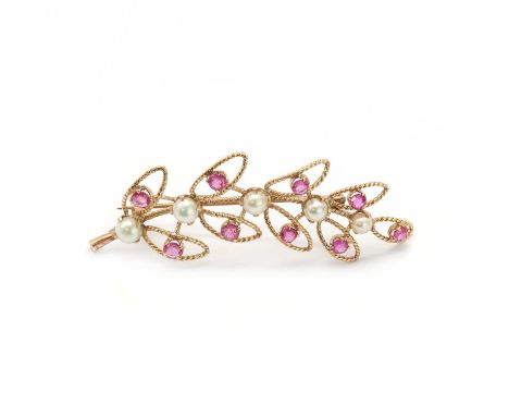 A gold ruby and freshwater pearl spray brooch,an openwork twist rope frame in the form of a spray, with pearl and ruby in cla