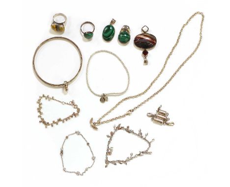 A silver azurite malachite brooch and earrings suite,an oval azurite malachite cabochon brooch, to pin back and roller catch,