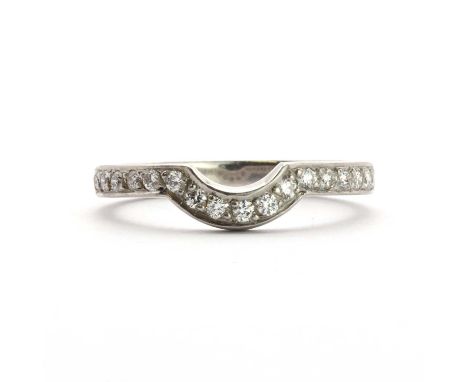 A platinum diamond set half eternity ring,a single row of brilliant cut diamonds, grain set, to a plain fitted band with a 'U