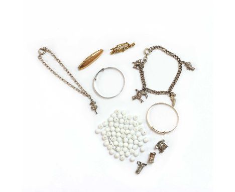 A small collection of gold and silver jewellery,comprising a late Victorian 9ct gold split pearl brooch with bird and wishbon