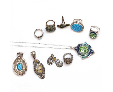 A small collection of silver jewellery,comprising a silver chalcedony and synthetic opal ring, 33mm diameter, a synthetic opa