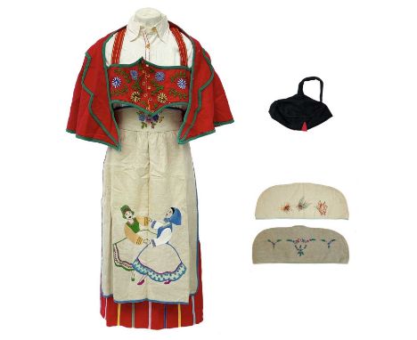 A ladies' Tyrolean wool and linen traditional outfit. Including, a blouse, skirt, apron, waistcoat, and hat, together with tw