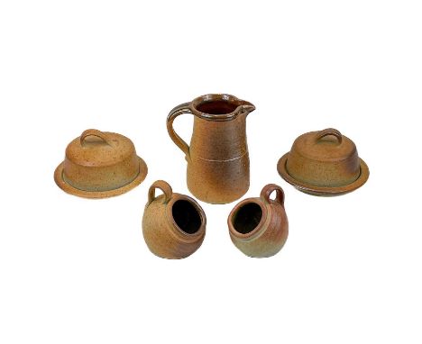 John Leach Mulchelney pottery including two cheese/butter dishes, jug, two salt pigs. (5)