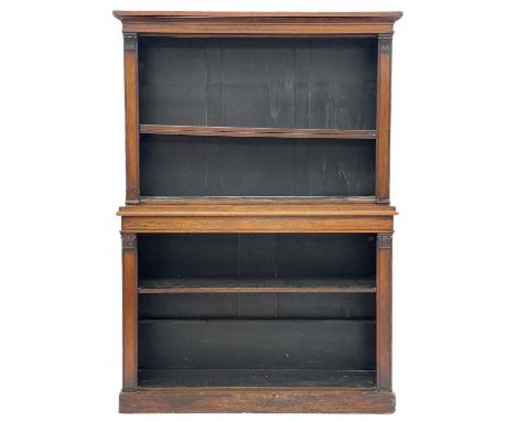 A Regency rosewood open two part bookcase. The stiles with moulded tops, height 176cm, width 121cm, depth 34cm.Please refer t