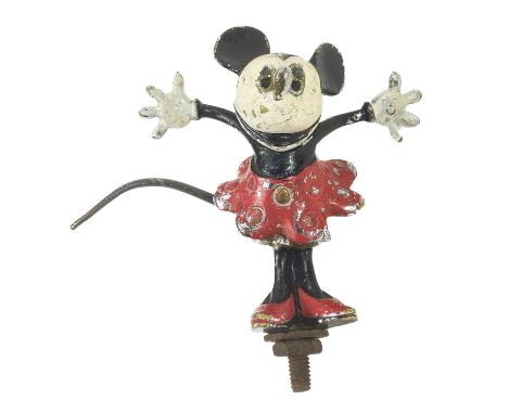 A rare Minnie Mouse car mascot  Circa 1930-40 cast metal and enamel painted, height 11cm.There is possibly a slight loss at t