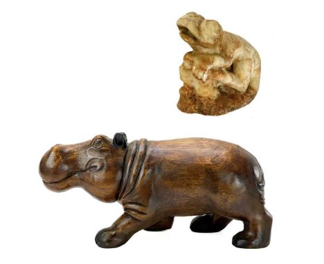 A carved marble chameleon. Height 22cm together with a wood carved model of a hippopotamus.