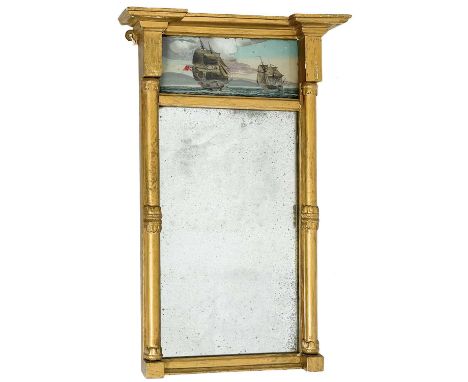 A Regency gilt pier glass. With reverse painted glass panel, height 61cm width 39cm.