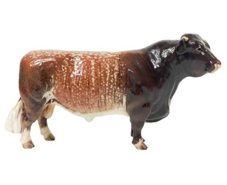 A Beswick pottery Shorthorn bull. Ch. 'Gwersylt Lord Oxford 74th' model number 7400, brown and cream gloss glaze, height 13cm