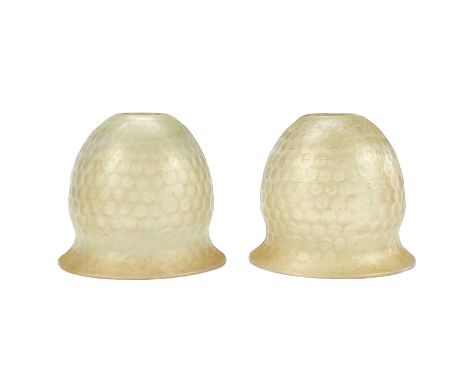 Pair of Vaseline glass light shades. Possibly Powell, with dimpled decoration, height 11cm, diameter 12cm.No condition issues