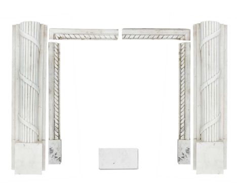 A Regency, white marble, part fire surround. With reeded carved column supports, lacking mantle, support height 110cm.