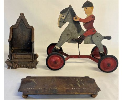 Harper Coronation 1953 throne money box (missing bottom), a child's pull along horse toy and a cribbage board&nbsp;