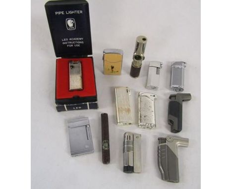 Collection of pipe cigarette lighters include Leo pipe lighter and Cohiba cigar shaped lighter&nbsp;