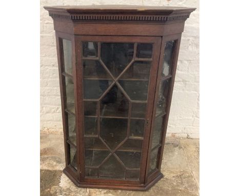 Georgian and later oak corner cupboard in the Chippendale style Ht 106cm W 73cm