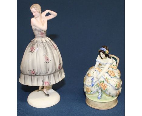 Two Goldscheider figurines signed Lorenzl - standing lady 19cm &amp; seated lady tying her shoes 10.5cm
