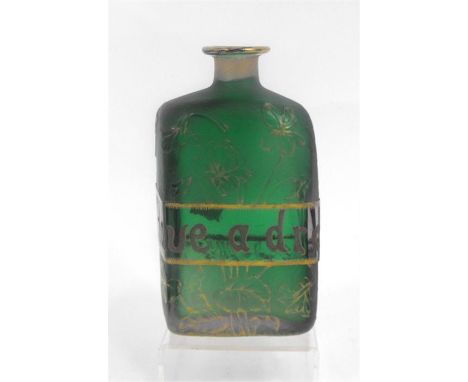 A Daum Nancy acid etched cameo glass decanter, "Have A Drop" decorated with flowers and foliage with gilt highlights 18cm hig