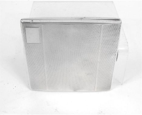 A silver cigarette case with engine turned decoration, London 1914, 8.5cm x 8.5cm (110g).