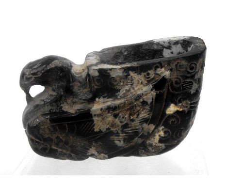 A mottled jade libation cup in the form of a bird 5.5cm high (possibly cut down) 