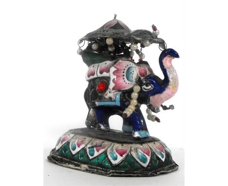 An Indian white metal and enamel capronised elephant 6.5cm high 