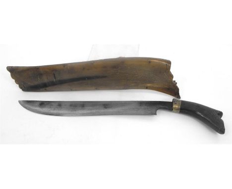 An Indonesian parang with horn handle and scabbard 42cm overall, blade length 30cm 