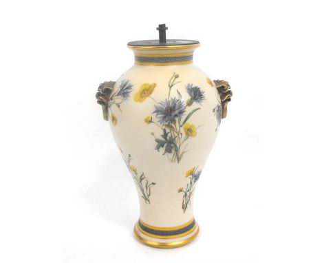 A Minton vase, decorated with flowers on a pale cream ground with mythical beast handles (converted to a lamp) (AF) 29cm high