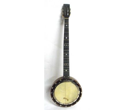 A rosewood banjo with mother of pearl inlay, 89cm high 