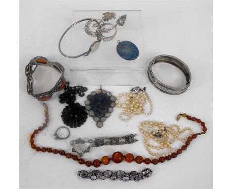 An opal set silver bangle, a filigree bracelet, a pearl necklace, and other items 