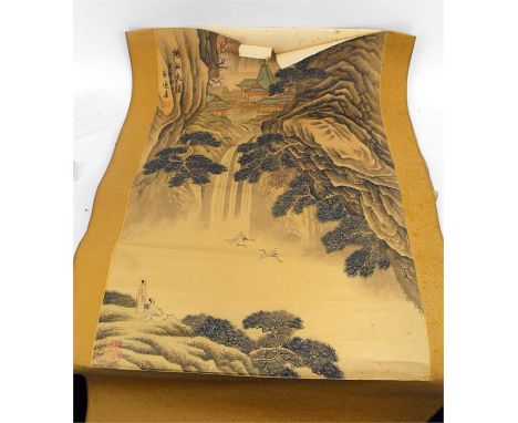 A Chinese scroll painting, depicting a mountainous scene, with ten character mark and seal mark 54cm x 84cm 