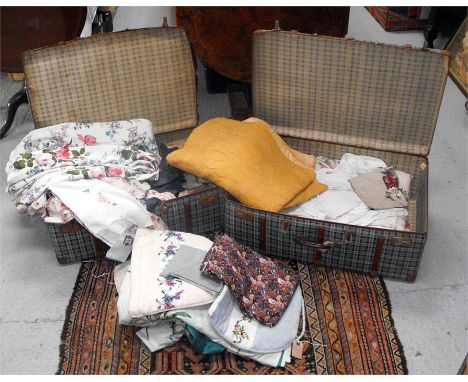 Two suitcases of vintage textiles 