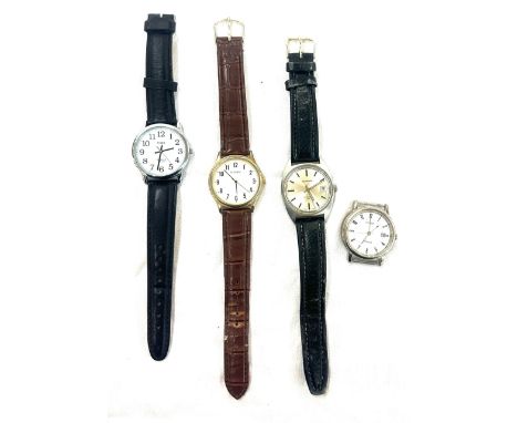 Selection of four gents wrist watches to include Garrard etc 